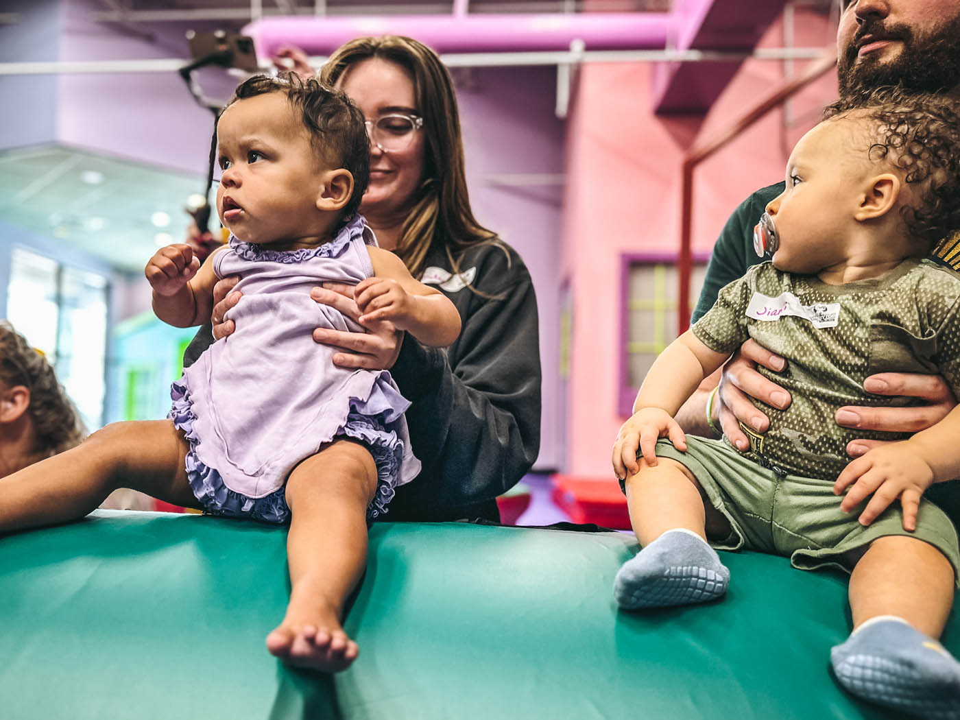 Adults with babies in Romp n' Roll's baby activities in Willow Grove, PA.