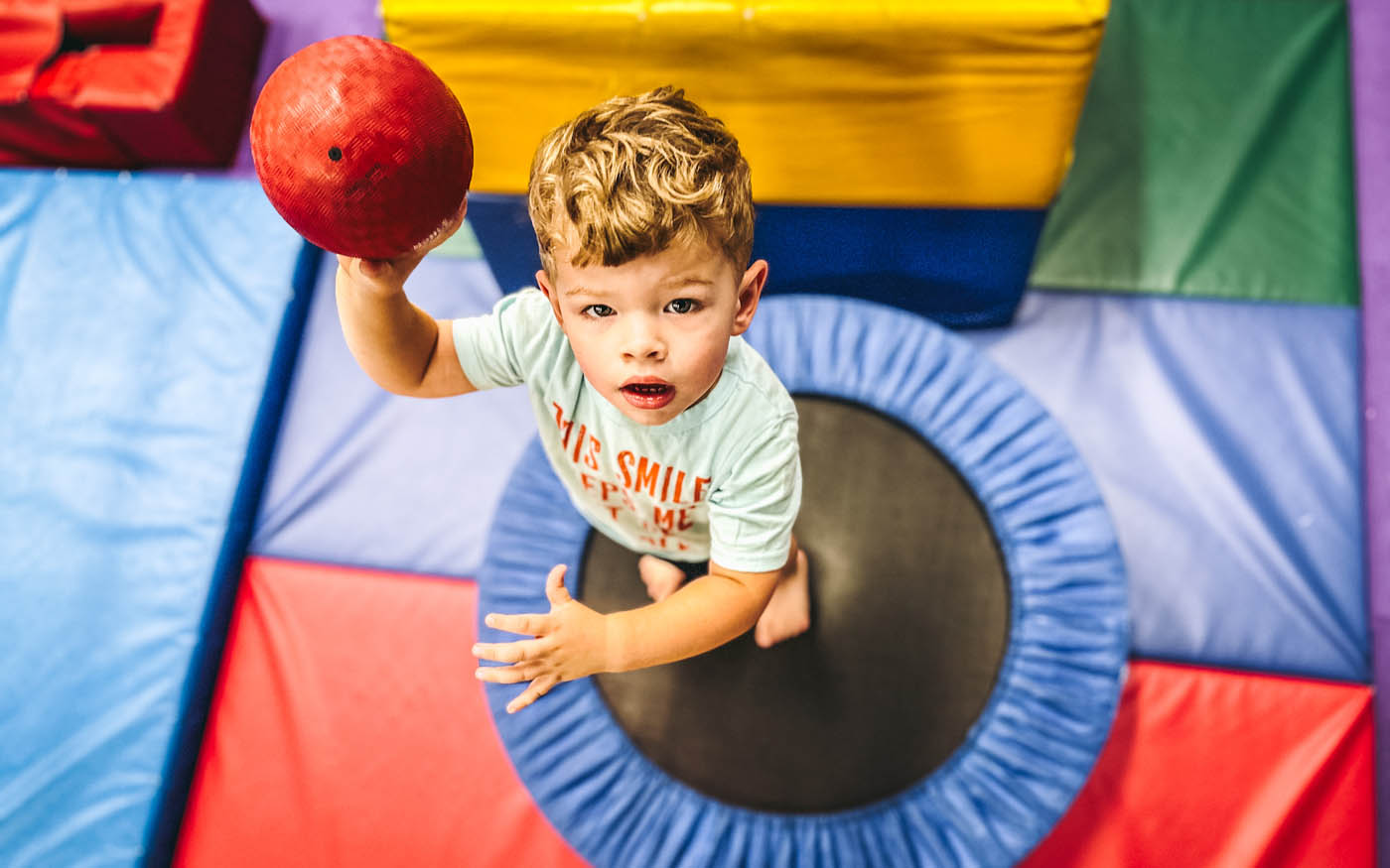 A toddler jumping on a Romp n' Roll tramp, learn more about our kids activities in Wethersfield, CT.